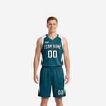 Custom teal basketball uniforms with white and black curved side panels, team name arc on chest and matching teal shorts with player number on leg