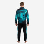 Custom teal and black soccer tracksuit jacket close-up showing stand collar, full zip, and galaxy print sleeve detail