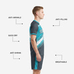 Custom charcoal soccer shorts with teal side stripe detail matching teal soccer uniform set