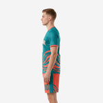 Custom teal and coral soccer uniform right side view showing breathable mesh construction and V-neck collar detail