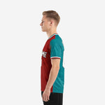 Close-up of back number print zone on custom teal and dark red soccer jersey showing full-dye sublimation quality