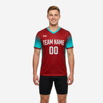 Custom teal soccer training jersey front view showing team name and number 00 on dark red chest with teal gradient sleeves and V-neck collar