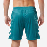 Elastic waistband detail on custom teal green soccer shorts showing drawcord and rib texture