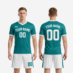 Full custom teal and white men soccer uniform kit showing jersey and shorts set