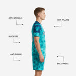 Custom teal and navy blue 2-piece soccer uniform kit with matching hex-print jersey and shorts for men