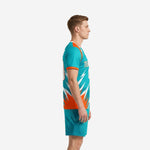 Custom teal soccer uniform left side view displaying full-dye sublimation print detail on orange and teal jersey and matching shorts