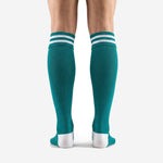 Close-up of custom teal soccer socks ribbed cuff with 2 white contrast stripes