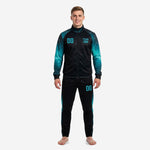 Custom teal soccer tracksuit with galaxy sublimation panels on sleeves and jet black body, front view on male model