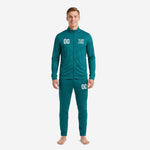 Custom teal soccer tracksuit jacket close-up showing full-zip stand collar construction and white chest logo print zone