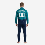 Teal soccer tracksuit jacket close-up showing stand collar full-zip front and chest team logo print zone
