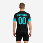 Custom teal soccer training jersey with jet black body and teal gradient sleeves, back view showing player name and number 00 in teal sublimation print