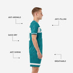 Close-up of teal soccer uniform chest panel showing team name and player number print zones