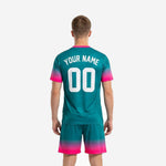 Custom teal soccer uniform jersey detail showing V-neckline hot pink trim and full-dye sublimated chest print