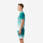 Soccer outfits for men in teal and white gradient, right side view showing white stripe trim and shorts fade
