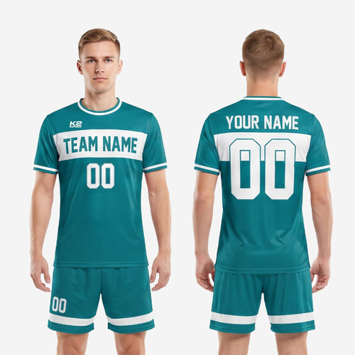 Full body view of custom teal and white soccer uniform set with sublimated print detail