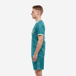 Custom teal and white soccer uniform set right side view showing crew neck trim and sleeve cuff white contrast detail