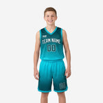 Custom teal youth basketball uniforms front and back view showing hex gradient design, V-neck jersey, and matching teal shorts with number 00