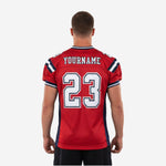 Back view of red and navy custom team football jersey showing back number placement and navy side panels on adult male model