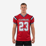 Custom team football jerseys in red and navy with sublimated team name arc and large front number 23 on adult male model