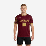 Custom training jerseys for teams in maroon and athletic gold with digital camo sleeve print, front view on male model