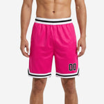 Custom travel team basketball shorts in hot pink with white and black V-notch hem and striped elastic waistband, front view with player number 00