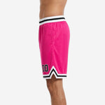 Opposite side view of sublimated pink basketball shorts for teams showing elastic waistband and chevron hem panel construction