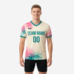 Custom two tone training jersey in cream and teal with rose pink splash pattern, front view showing team name and number print