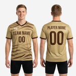 Back view of custom Vegas Gold mens custom training jersey showing player surname and number print zones