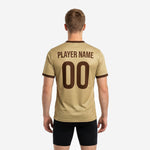 Close detail of full-dye sublimated wave graphic on custom Vegas Gold soccer training jersey for club squads