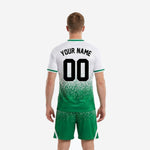 Custom white and Kelly Green soccer uniform set showing back player name and number sublimation print