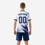 Custom white soccer jersey detail showing team name and number print zones with purple and teal sublimation graphic