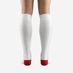 Custom white and red soccer socks ribbed elastic cuff detail for stay-up grip during match