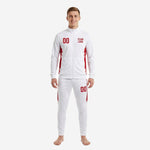 Custom white soccer tracksuit with red brush-stroke side panels, full-zip jacket and tapered pants, front view on male model