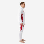 Custom white and red soccer tracksuit side view showing red brush panel running from jacket chest to pants thigh