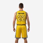 Close detail of honeycomb panel design on yellow and black custom basketball uniform set