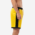 Custom yellow soccer shorts showing black side panel and yellow drawcord waistband, right side view on adult male model