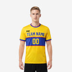 Custom yellow soccer jersey front view showing team name in Royal Blue lettering and front number on blue chest band