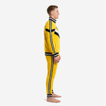 Custom yellow soccer tracksuit showing black and white side stripes on tapered pants and ribbed cuffs, left side view