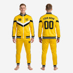 Full custom yellow and black soccer tracksuit set in Athletic Gold with sublimated chevron design, complete 2-piece kit