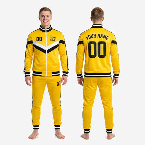 Full custom yellow and black soccer tracksuit set in Athletic Gold with sublimated chevron design, complete 2-piece kit