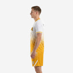 Custom yellow soccer uniform Athletic Gold and White opposite side view showing sleeve trim and shorts side stripe