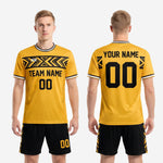 Full custom yellow soccer uniform back view showing Athletic Gold jersey with player name and number in black, and matching black shorts