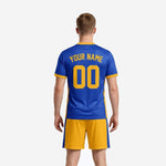 Close detail of custom yellow soccer uniform Royal Blue jersey with Athletic Gold neckline trim and sublimated chest team name print