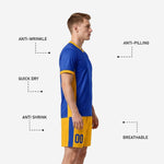 Custom yellow soccer uniform Athletic Gold shorts with Royal Blue side stripe and sublimated player number on left thigh