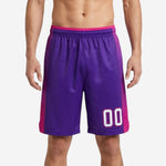 Custom youth basketball shorts in purple and hot pink with diagonal stripe side panels and player number 00 on front leg, front view