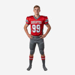 Custom youth club football uniforms in red and gray showing arched team name and front number 99 on sublimated jersey with matching gray pants and triple side stripe