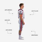 Back view of white sublimated youth football uniform showing back number placement, player nameplate area, navy and red shoulder panel detail, and matching pant stripe