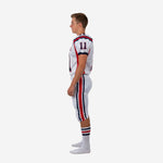 Side view of custom youth football uniform set showing red and navy side panel on jersey and wide red center stripe flanked by navy lines running the length of the pant leg
