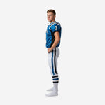Reverse side view of custom youth football uniforms in royal blue with black shoulder panel and white matching pants with blue center stripe flanked by black stripes on the outer leg