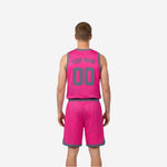 Shorts detail of grey and pink reversible basketball uniform set showing elastic drawcord waistband and side split hem